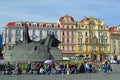 Beautiful brightly painted baroque palaces and Hus Memorial old town square prague